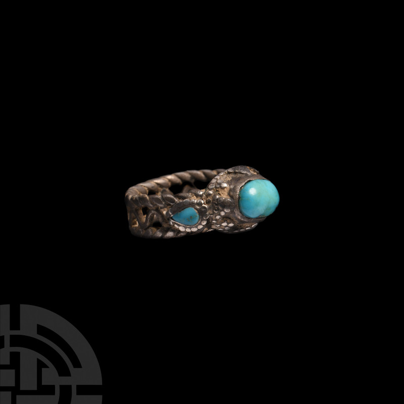 Western Asiatic Silver Ring with Turquoise Gemstones 18th-19th century A.D. A si...