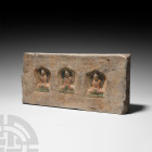 Chinese Wei Buddha Brick Northern Wei Dynasty, 386-534 A.D. A rectangular ceramic brick featuring three ogival niches, each containing a Buddha figure...