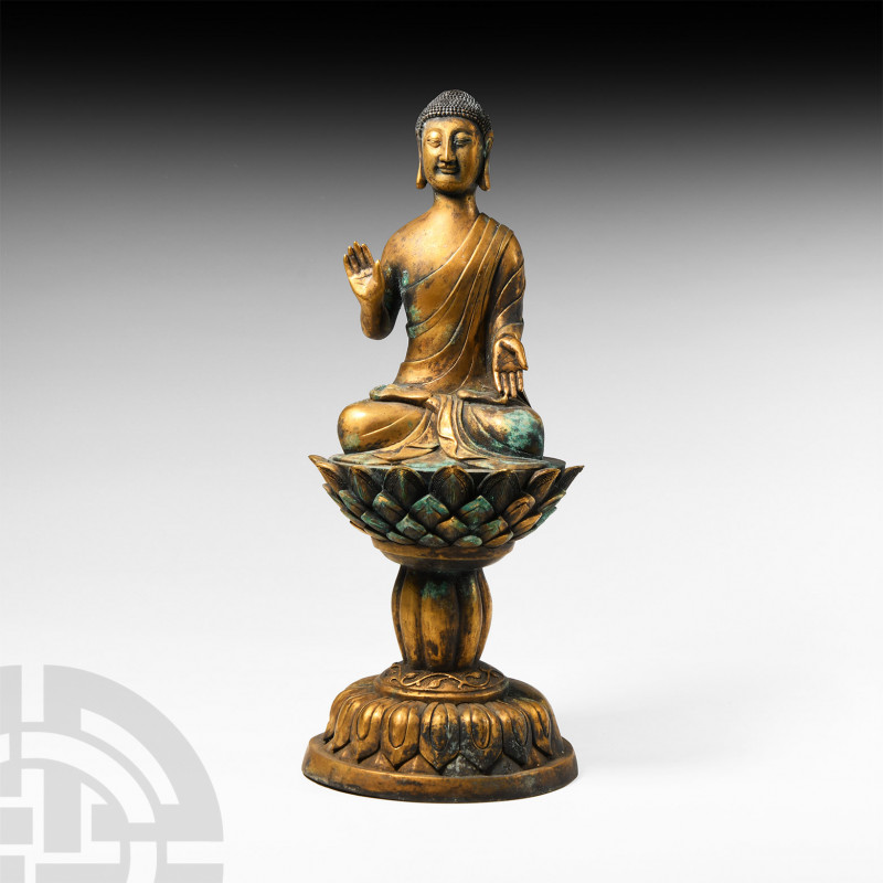 Tibetan Gilt Bronze Buddha Statue 20th century A.D. or earlier. A gilt bronze st...