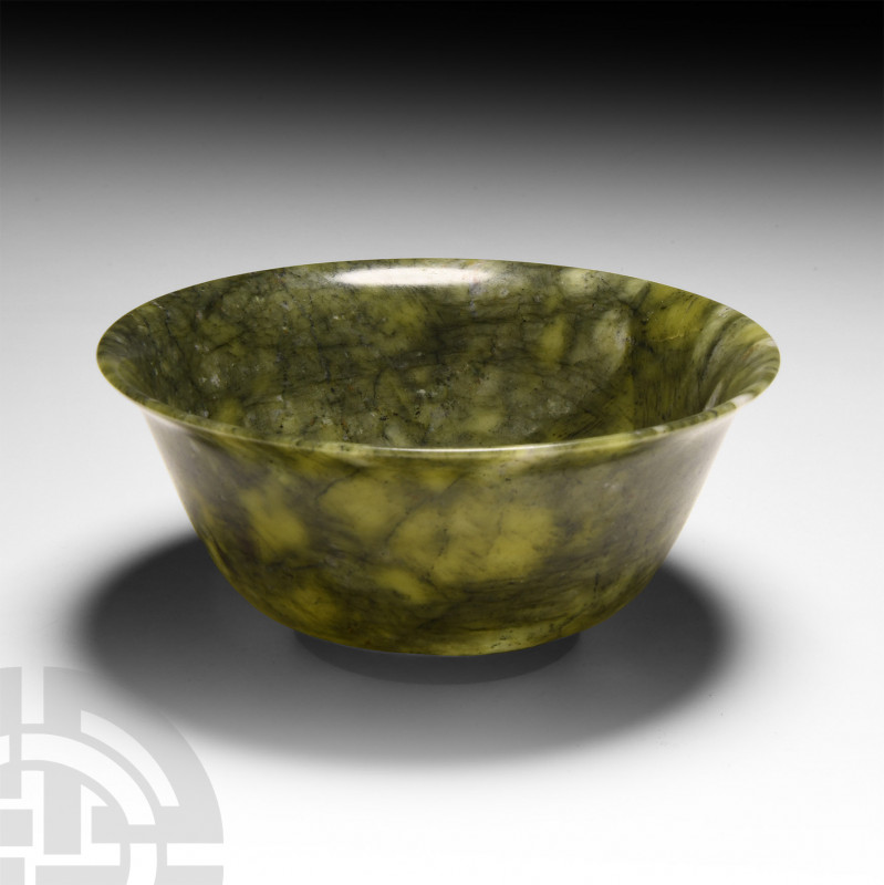 Chinese Mottled Green Jade Bowl 19th-20th century A.D. A polished mottled dark g...