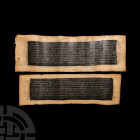 Tibetan Sutra Page Group 18th-19th century A.D. A group of two undated bifacial paper scrolls, each with two faces with a glossy black panel and multi...