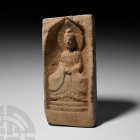Chinese Wei Buddha Brick Northern Wei Dynasty, 386-534 A.D. A rectangular ceramic Buddha brick with robed and nimbate Buddha seated on a dais within a...
