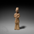 Large Chinese Tang Warrior Attendant Figure Tang Dynasty, 618-907 A.D. or later. A terracotta warrior, depicted as a fully armoured soldier, shown wea...