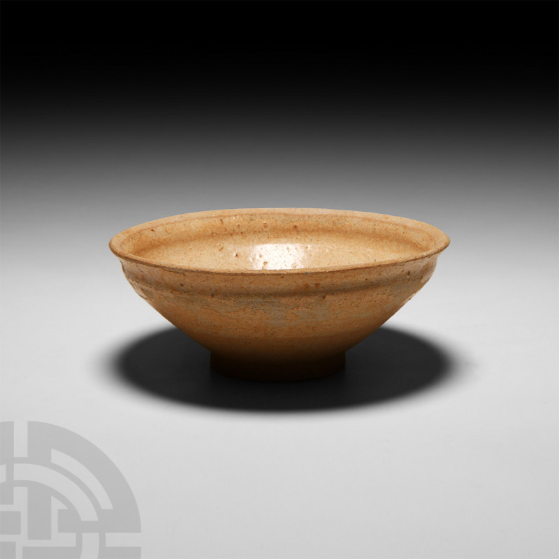 Chinese Glazed Bowl Circa 618-1279 A.D. A Tang or Song period bowl with a carina...