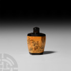 Chinese Snuff Bottle with Figural Scene 20th century A.D. A hexagonal carved bone and horn snuff bottle with broad shoulder, body decorated with figur...
