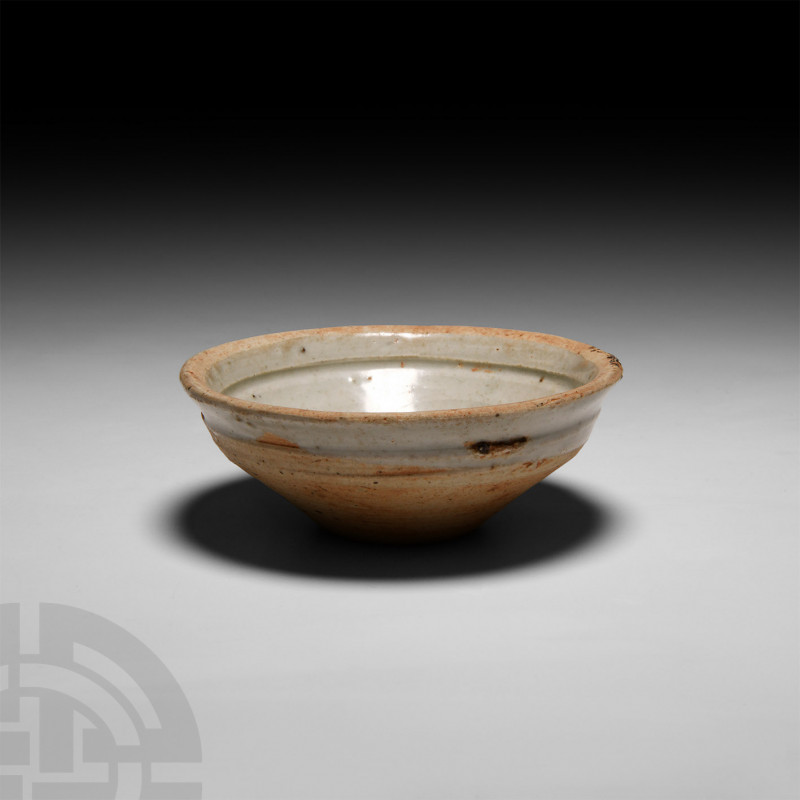 Chinese Glazed Bowl Circa 618-1279 A.D. A Tang or Song period bowl composed of a...