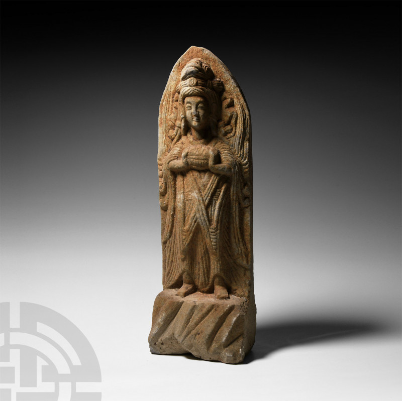 Chinese Buddha Figure Circa 19th century A.D. An archaistic, Wei-style stone Bud...