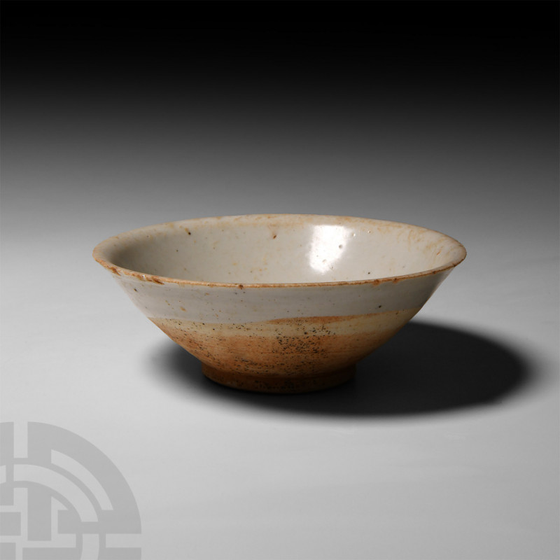 Chinese Glazed Bowl Circa 618-1279 A.D. A Tang or Song ceramic bowl with conical...