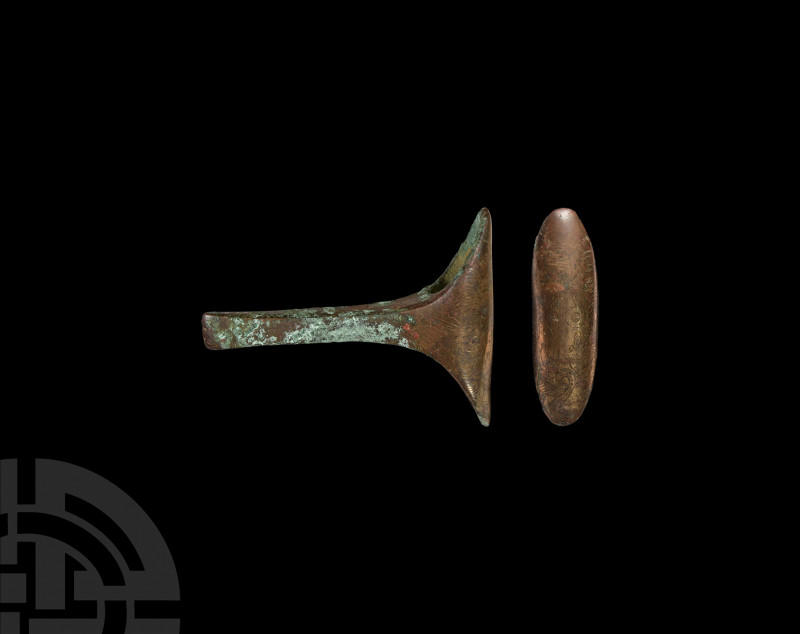 Western Asiatic Decorated Axehead 2nd millennium B.C. A substantial bronze axehe...