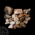 Stone Age Implement and Core Collection Neolithic, 8th-5th millennium B.P. A group of 21 flint implements and cores. 1.84 kg total, 35-97 mm (1 3/8 - ...