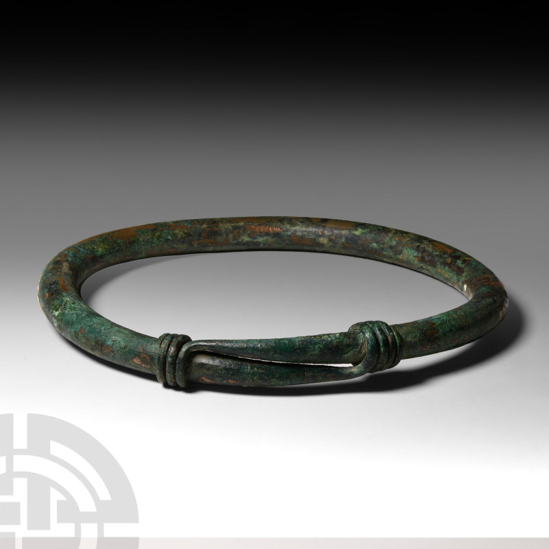 Large Bronze Age Arm Ring with Coiled Terminals 2nd millennium B.C. A substantia...