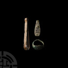 Anglo-Saxon and Other Artefact Group 2nd-14th century A.D. A mixed bronze group comprising: an Anglo-Saxon tongue-shaped strap end with pelleted borde...