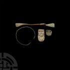 Saxon Artefact Collection Circa 4th-7th century A.D. A mixed group of metallic artefacts comprising: a strap end decorated with pellet borders and zoo...