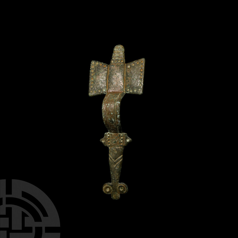 Saxon Cruciform Bow Brooch 6th century A.D. A bronze cruciform brooch comprising...