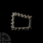 Norman 'Thames' Studded Buckle Frame 11th-12th century A.D. A Norman period buckle frame of trapezoidal shape, three sides studded with pellets. 29.1 ...