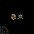 Medieval Horse Harness Pendant and Mount Group 13th-14th century A.D. A group of two bronze harness mounts comprising: a discoid stud with advancing h...