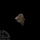 Medieval 'Thames' Angel's Wing Pilgrim's Badge Circa 15th century A.D. A lead-alloy pilgrim's badge in the form of an angel's wing with feather detail...