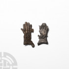 Medieval 'Thames' Gloves of St Thomas Becket Pilgrim's Badge Group 14th century A.D. A group of two pewter pilgrim's badges in the form of Thomas Beck...