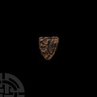 Medieval Heraldic Horse Harness Pendant 13th-14th century A.D. A bronze heater-shaped pendant with arms blazoned a lion rampant queue forchee, the arm...