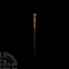 Medieval 'Thames' Bone-Handled Stylus 12th-15th century A.D. A bone-handled stylus with tapering, round-section body and finial decorated with X-motif...