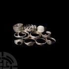 Silver Ring Group 20th-21st century A.D. A mixed group of ten, mainly silver finger rings of various sizes and designs, including an example composed ...