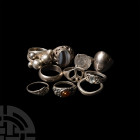 Silver Ring Group 20th-21st century A.D. A mixed group of 11, mainly silver, finger rings of various sizes and designs, including examples incorporati...
