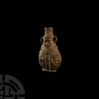 Grand Tour Figural Flask with Hieroglyphs 19th-20th century A.D. A bifacial ceramic flask with lenticular body, the lower part of the neck formed as a...