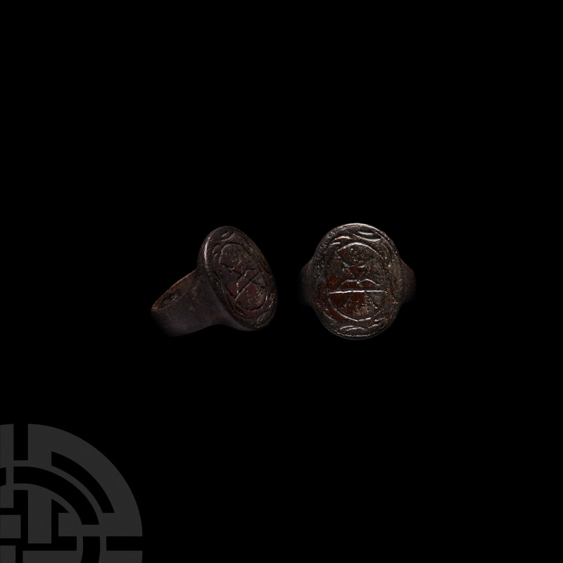 Stuart Period Ring with Bow and Arrow Motif 17th century A.D. A copper-alloy rin...