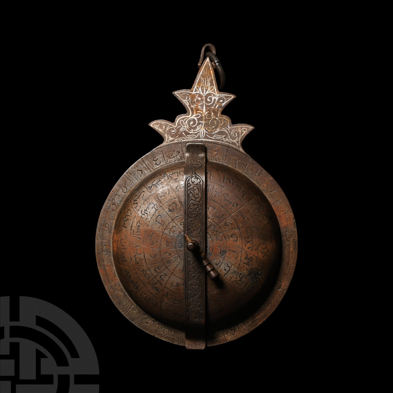 Silver Inlaid Astrolabe 20th century A.D. A base metal astrolabe, discoid with s...