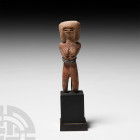 Prehispanic Valdivia Style Venus Figure 20th century A.D. A ceramic figurative sculpture representing a naked female figure, modelled in the round wit...