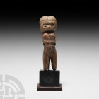 Prehispanic Valdivia Style Venus Figure 20th century A.D. A figurative ceramic sculpture representing a naked female figure, modelled in the round wit...