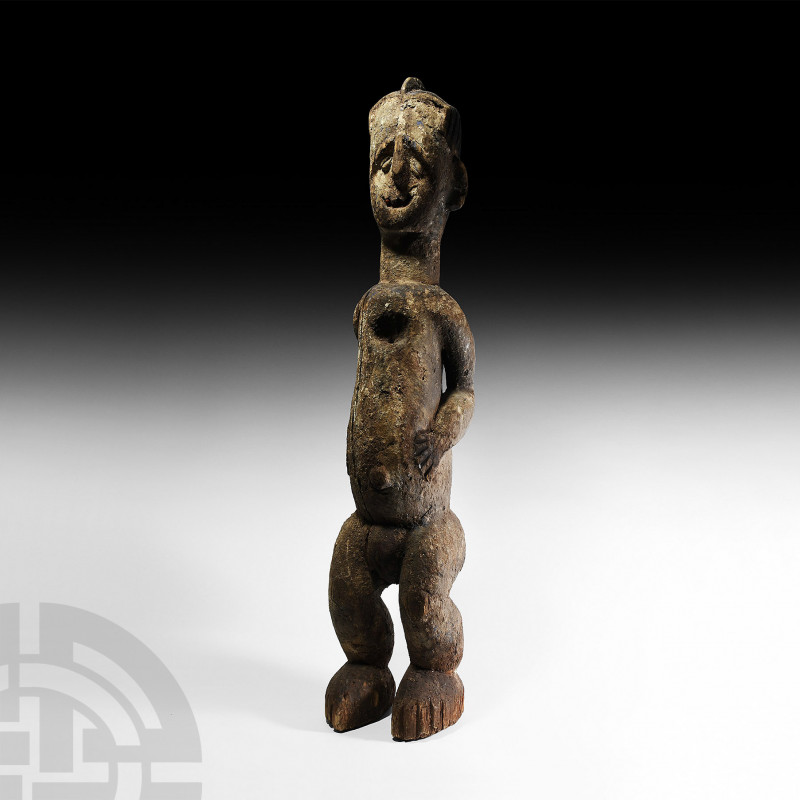 Large West African Standing Wooden Figure 19th-20th century A.D. A large carved ...