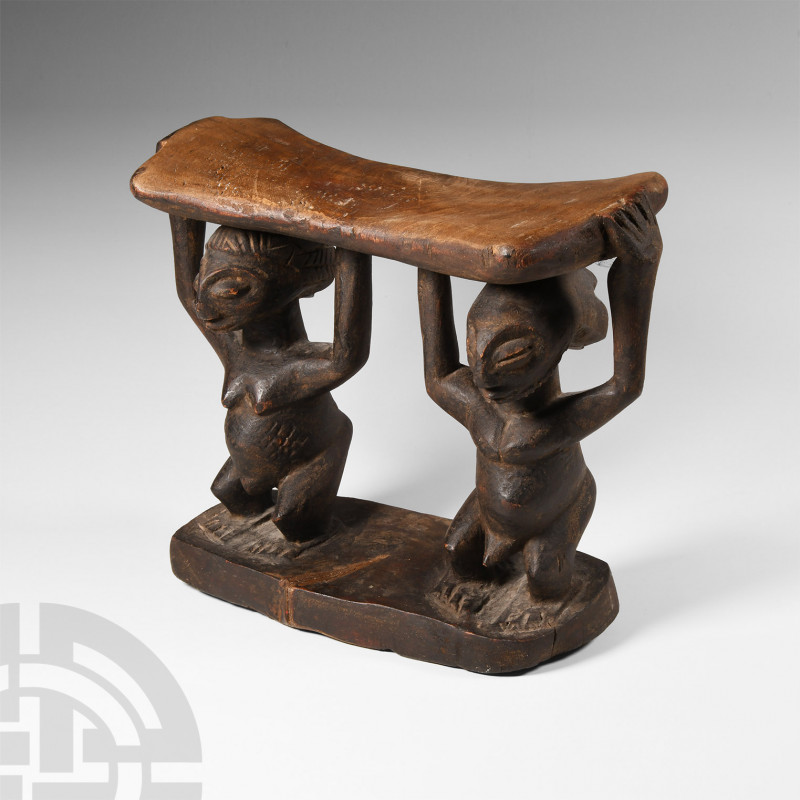 African Congo Wooden Head Rest 20th century A.D. A wooden head rest comprising a...