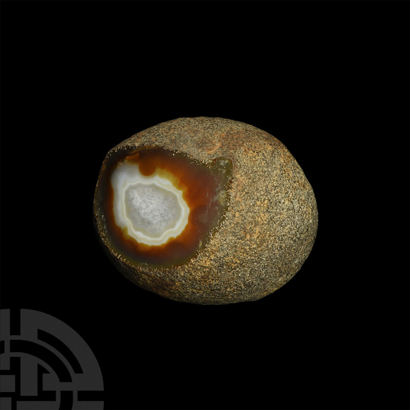 Partially Cut and Polished Agate Geode A bulbous agate geode with one cut and po...