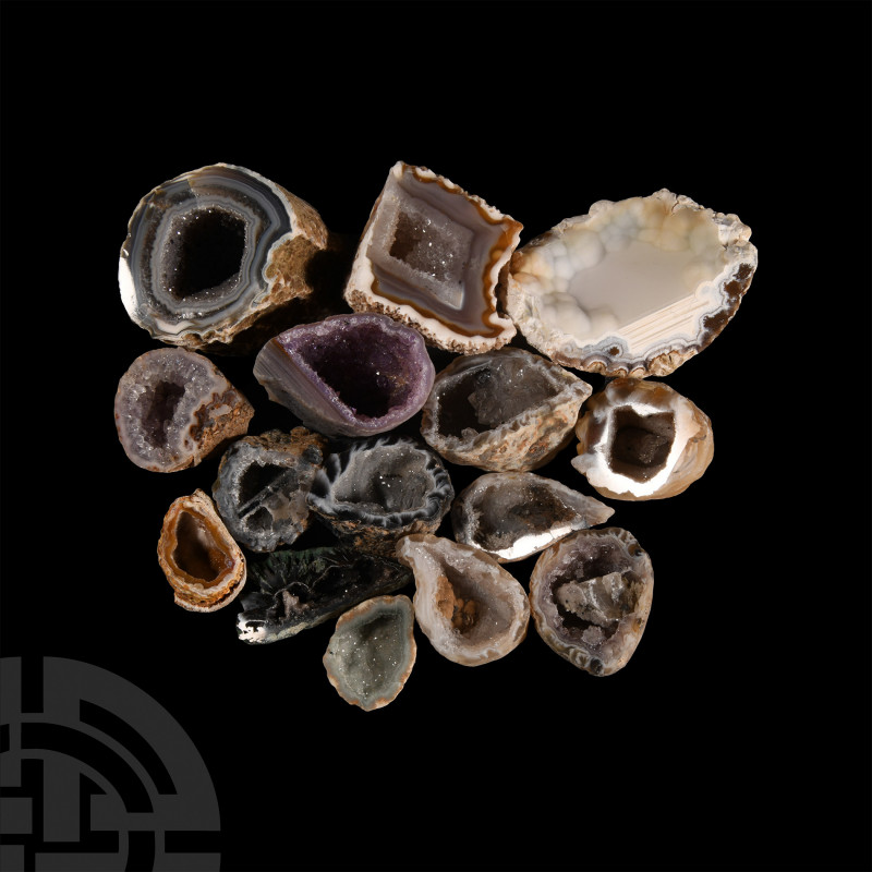 Cut and Polished Crystal Geode Half Collection A group of 15 cut and polished na...