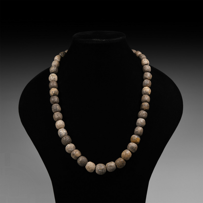 Mammoth Bone Bead Necklace Pleistocene Period, circa 800,000 years B.P. A bead n...