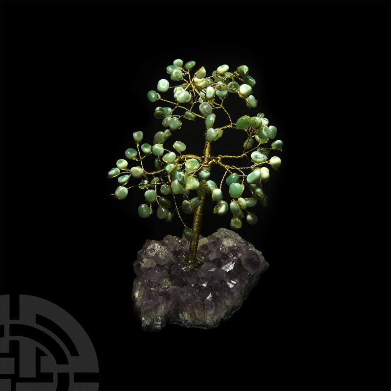 Green Agate Gem Tree on Amethyst A large gemstone tree consisting of a brass tru...