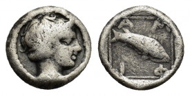 Macedon, Amphipolis, c. 357-353 BC. AR Obol (8mm, 0.45g). Young male head r., wearing tainia. R/ Fish (perch) leaping downward right within linear squ...