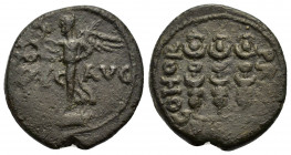 Macedon, Philippi, c. AD 41-68. Æ (18mm, 3.70g). Nike standing l. on base, holding wreath and palm. R/ Three standards. RPC I 1651; SNG Copenhagen 305...