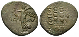 Macedon, Philippi, c. AD 41-68. Æ (16mm, 2.80g). Nike standing l. on base, holding wreath and palm. R/ Three standards. RPC I 1651; SNG Copenhagen 305...