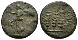 Macedon, Philippi, c. AD 41-68. Æ (18mm, 4.70g). Nike standing l. on base, holding wreath and palm. R/ Three standards. RPC I 1651; SNG Copenhagen 305...