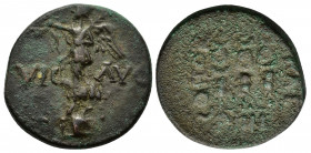 Macedon, Philippi, c. AD 41-68. Æ (19mm, 4.80g). Nike standing l. on base, holding wreath and palm. R/ Three standards. RPC I 1651; SNG Copenhagen 305...