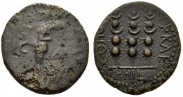 Macedon, Philippi, c. AD 41-68. Æ (18mm, 3.20g). Nike standing l. on base, holding wreath and palm. R/ Three standards. RPC I 1651; SNG Copenhagen 305...