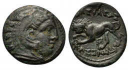 Kings of Macedon, Kassander (305-298 BC). Æ (15mm, 2.60g). Pella. Head of Herakles r., wearing lion skin. R/ Lion advancing l., breaking spear. HGC 3....