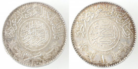 Monete Estere. Arabia Saudita. Ryal 1950. Ag. Km. 18. Peso gr. 11,74. Diametro mm. 30. SPL. Colpo al bordo. (8321)
