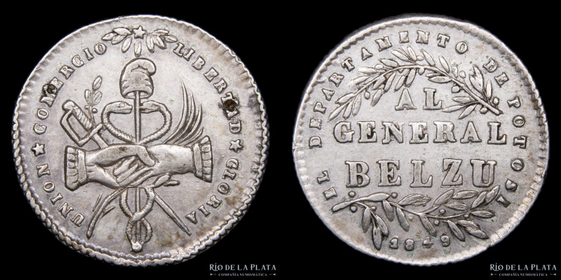 Bolivia. 1849. 1 Sol. Potosí al Presidente Belzu. AG; 20mm; 3.22g. A: Dos manos ...