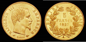 France Five Francs Gold 1857A KM#787.1 UNC with a thin hairline scratch on the portrait, a sharp and lustrous example, seldom seen in this high grade...