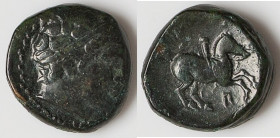 MACEDONIAN KINGDOM. Philip II (359-336 BC). AE unit (18mm, 7.63 gm, 11h). VF. Uncertain mint in Macedonia. Head of Apollo right, wearing taenia / ΦIΛI...
