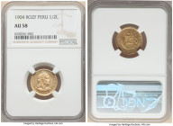 Republic gold 1/2 Libra 1904-ROZF AU58 NGC, KM209. The obverse displays a shield within sprigs with a golden sun above it. 

HID09801242017

© 2022 He...