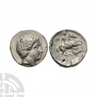Patraos of Paeonia - Apollo AR Tetradrachm 340-315 B.C. Obv: laureate head of Apollo right. Rev: PATRAOY beneath horseman right, spearing a fallen lyi...